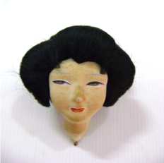 Boneca (souvenir) (fragmento)