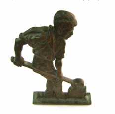 Estatueta; baixo relevo?